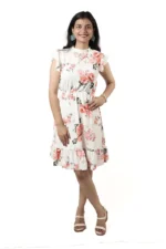 Woman wearing a white floral ruffle dress, front view, smiling