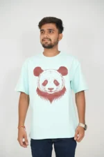 Man wearing mint blue t-shirt and jeans in front-facing view
