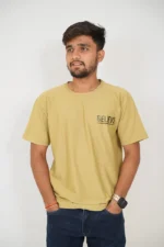 Man wearing mustard yellow t-shirt with short sleeves, front view