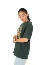 Left side view of woman in dark green oversized casual t-shirt