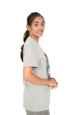 Side view of woman wearing plain grey t-shirt and grey pants