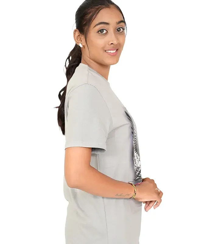 Side view of woman wearing plain grey t-shirt and grey pants