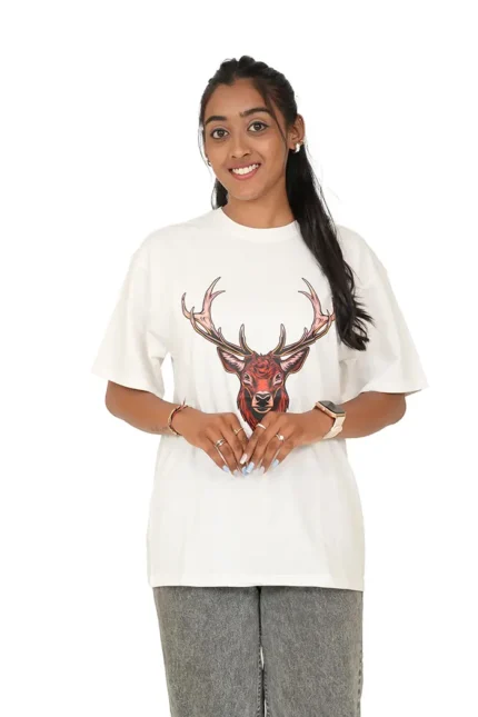 Woman modeling white oversized t-shirt and grey jeans front-facing