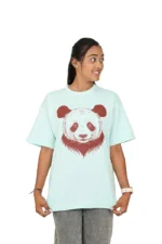 Woman facing sideways in mint blue t-shirt front view
